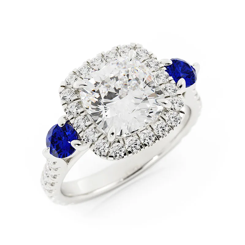 Cushion halo with sapphire sides